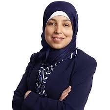 Headshot of Sara Minkara, Lebanese-American disability rights leader and inclusive leadership expert.